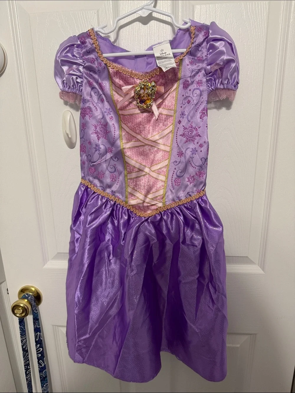 Disney children’s play wardrobe or costumes. There are nine dresses